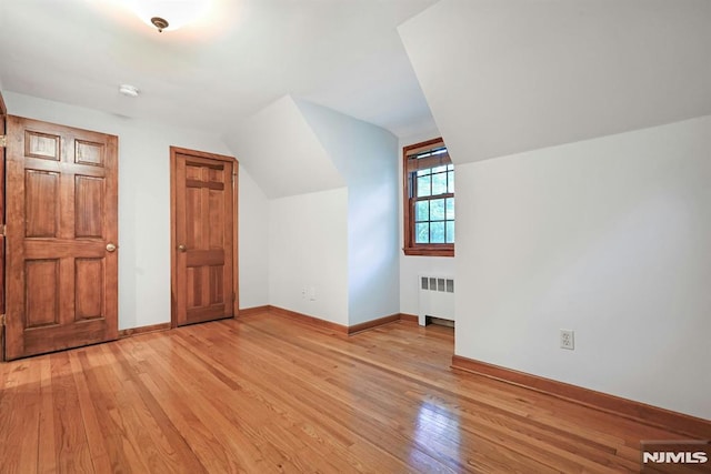68 Birch St, Ramsey, NJ 07446 - bonus room with radiator, light wood finished floors, baseboards, and vaulted ceiling