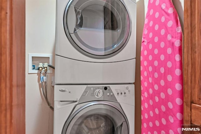 68 Birch St, Ramsey, NJ 07446 - laundry room featuring estacked washer and dryer