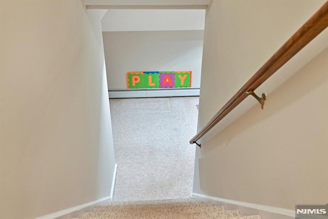 68 Birch St, Ramsey, NJ 07446 - staircase with carpet floors, baseboards, and a baseboard heating unit