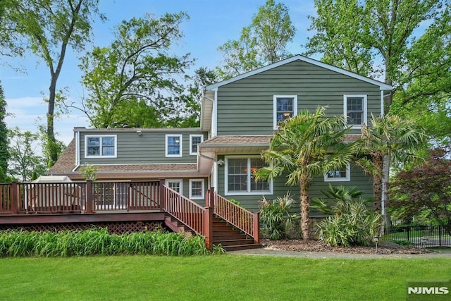 68 Birch St, Ramsey, NJ 07446 - back of property featuring a wooden deck and stairway