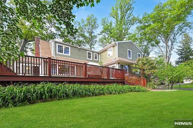 68 Birch St, Ramsey, NJ 07446 - back of property featuring a wooden deck and a chimney