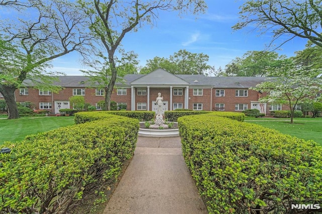 151 Palisade Ave Unit C8, Englewood, NJ 07631 - greek revival inspired property featuring a front yard and brick siding