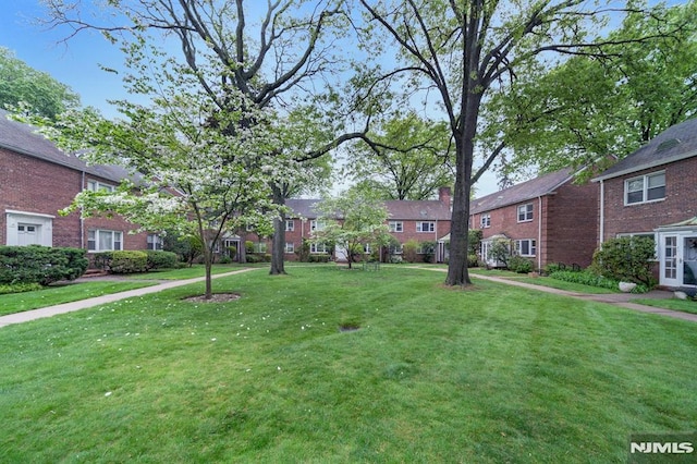 151 Palisade Ave Unit C8, Englewood, NJ 07631 - view of property's community featuring a residential view and a lawn