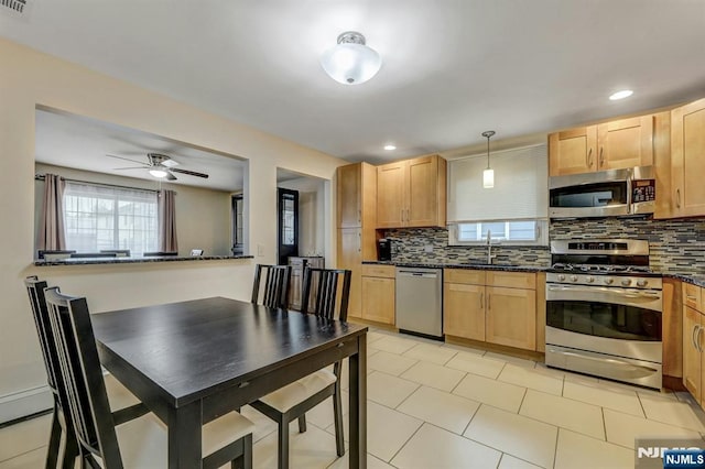 830 Pennsylvania Ave, Lyndhurst, NJ 07071 - kitchen featuring appliances with stainless steel finishes, backsplash, a sink, light brown cabinets, and recessed lighting