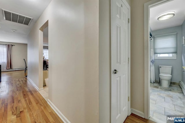 830 Pennsylvania Ave, Lyndhurst, NJ 07071 - hall with baseboards and light wood-type flooring