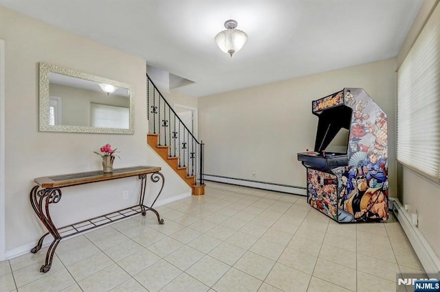 830 Pennsylvania Ave, Lyndhurst, NJ 07071 - foyer entrance with a baseboard radiator, stairway, and baseboards