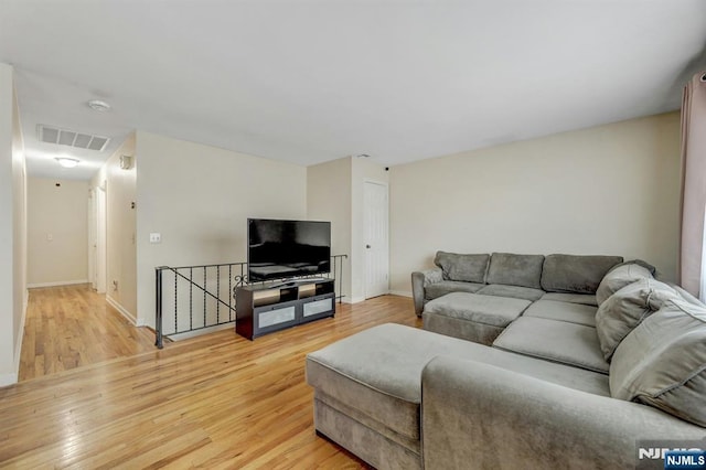 830 Pennsylvania Ave, Lyndhurst, NJ 07071 - living room with light wood finished floors and baseboards