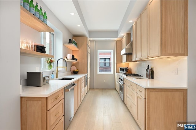 500 Hudson St Unit 2A, Hoboken, NJ 07030 - kitchen featuring open shelves, a sink, stainless steel appliances, healthy amount of natural light, and recessed lighting