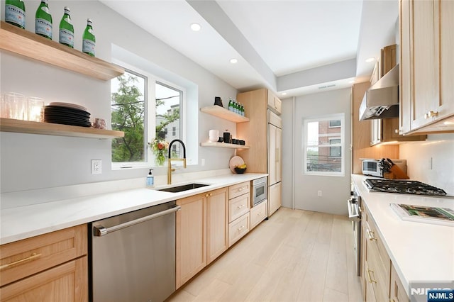 500 Hudson St Unit 2A, Hoboken, NJ 07030 - kitchen with open shelves, built in appliances, a sink, under cabinet range hood, and light brown cabinetry