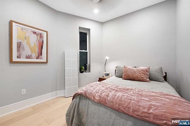 500 Hudson St Unit 2A, Hoboken, NJ 07030 - bedroom with wood finished floors, baseboards, and recessed lighting