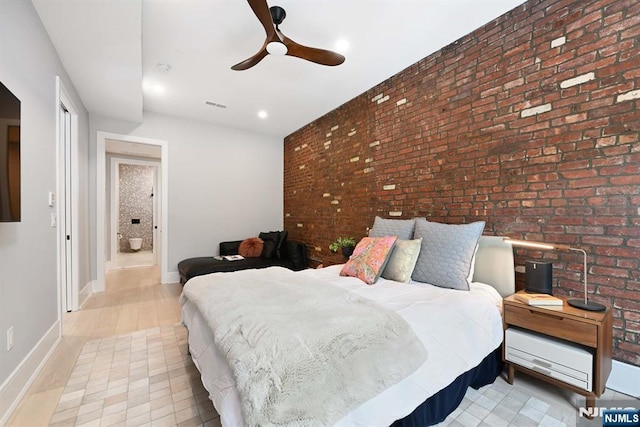 500 Hudson St Unit 2A, Hoboken, NJ 07030 - bedroom featuring brick wall, baseboards, ceiling fan, and recessed lighting