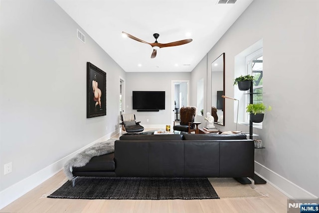 500 Hudson St Unit 2A, Hoboken, NJ 07030 - living area featuring wood finished floors, a ceiling fan, and baseboards