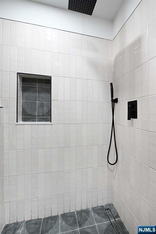 606 1st St Unit 1, Hoboken, NJ 07030 - full bathroom featuring a tile shower