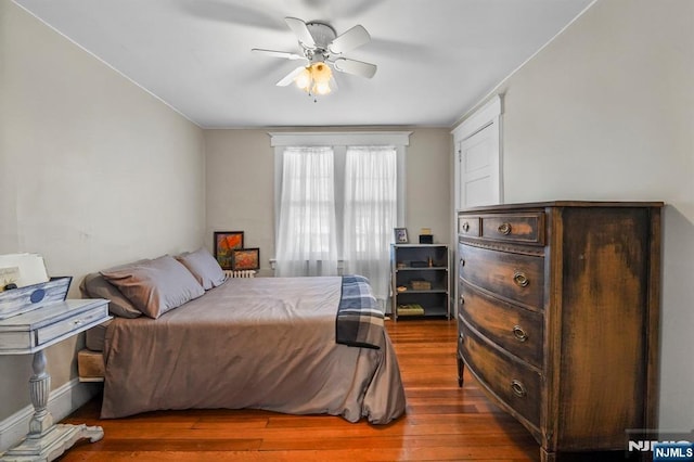 11 Harrington St, Hillsdale, NJ 07642 - bedroom with dark wood finished floors and ceiling fan