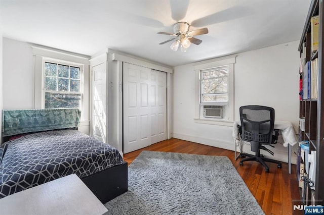 11 Harrington St, Hillsdale, NJ 07642 - bedroom featuring wood finished floors, cooling unit, multiple windows, and baseboards