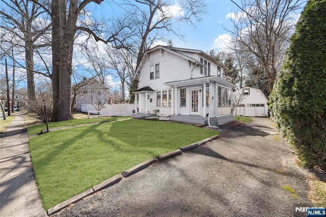 11 Harrington St, Hillsdale, NJ 07642 - view of front of property featuring a garage, an outdoor structure, and asphalt driveway
