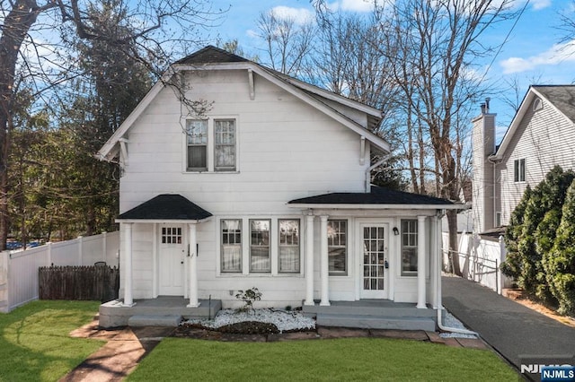 11 Harrington St, Hillsdale, NJ 07642 - rear view of house featuring roof with shingles