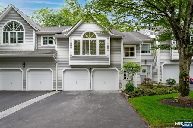 3 Bradshaw Ct Unit 509, Hillsdale, NJ 07642 - multi unit property with an attached garage, asphalt driveway, and a shingled roof