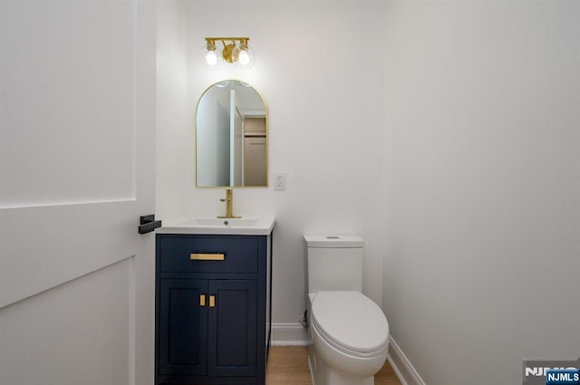 3 Bradshaw Ct Unit 509, Hillsdale, NJ 07642 - half bath featuring vanity, toilet, and baseboards