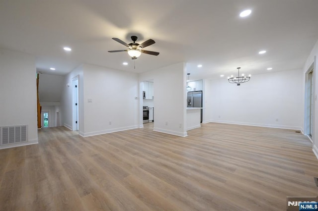 3 Bradshaw Ct Unit 509, Hillsdale, NJ 07642 - unfurnished living room with ceiling fan, recessed lighting, a chandelier, baseboards, and light wood-style flooring