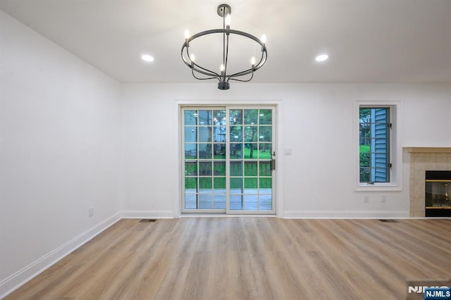 3 Bradshaw Ct Unit 509, Hillsdale, NJ 07642 - unfurnished dining area featuring a chandelier, baseboards, wood finished floors, healthy amount of natural light, and recessed lighting