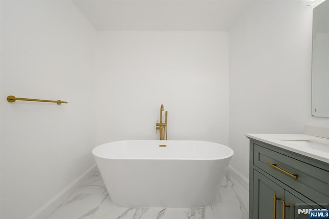 3 Bradshaw Ct Unit 509, Hillsdale, NJ 07642 - full bath with marble look tiles, a soaking tub, vanity, and baseboards