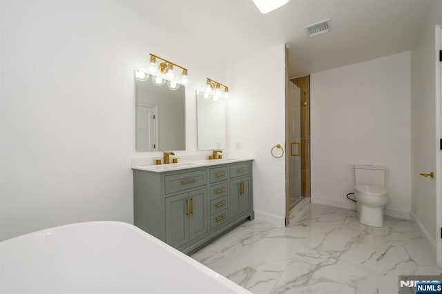 3 Bradshaw Ct Unit 509, Hillsdale, NJ 07642 - bathroom with double vanity, a freestanding tub, a shower stall, marble finish flooring, and toilet