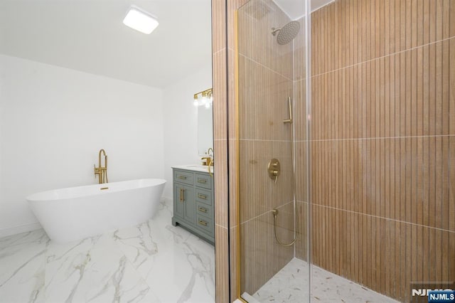 3 Bradshaw Ct Unit 509, Hillsdale, NJ 07642 - bathroom featuring tiled shower, vanity, a freestanding tub, and marble finish floors
