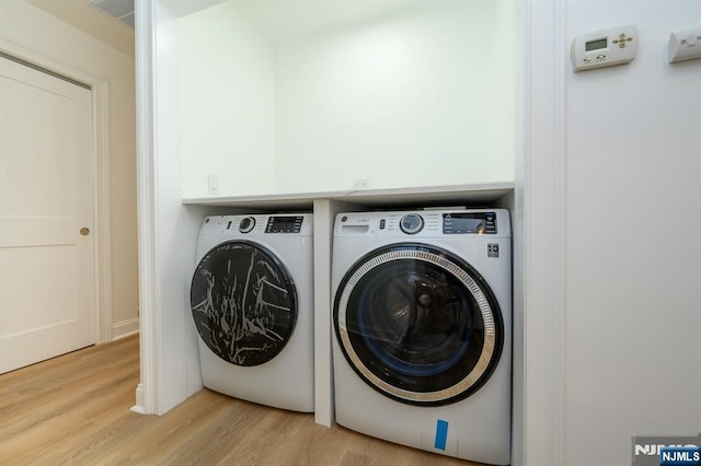 3 Bradshaw Ct Unit 509, Hillsdale, NJ 07642 - laundry area with washing machine and dryer and light wood-type flooring