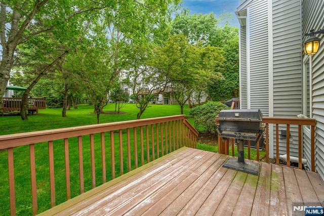 3 Bradshaw Ct Unit 509, Hillsdale, NJ 07642 - wooden terrace featuring a lawn