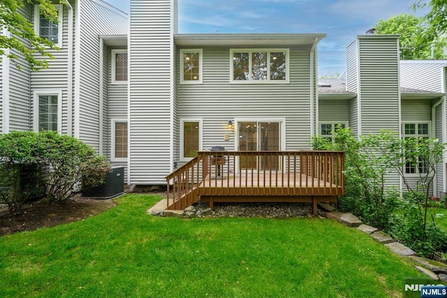 3 Bradshaw Ct Unit 509, Hillsdale, NJ 07642 - back of house featuring a chimney, a yard, a wooden deck, and central AC