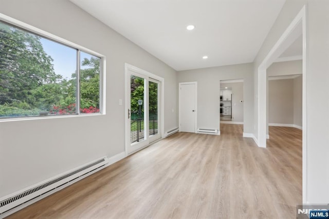 444 Black Oak Ridge Rd, Wayne, NJ 07470 - spare room with baseboard heating, light wood-type flooring, baseboards, and recessed lighting