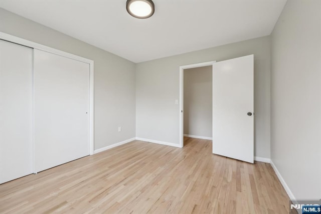 444 Black Oak Ridge Rd, Wayne, NJ 07470 - unfurnished bedroom featuring light wood-type flooring, a closet, and baseboards