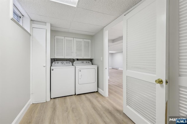 444 Black Oak Ridge Rd, Wayne, NJ 07470 - laundry area featuring separate washer and dryer, baseboards, and light wood-style flooring