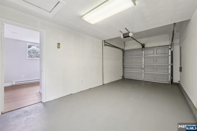 444 Black Oak Ridge Rd, Wayne, NJ 07470 - garage with baseboard heating and a garage door opener