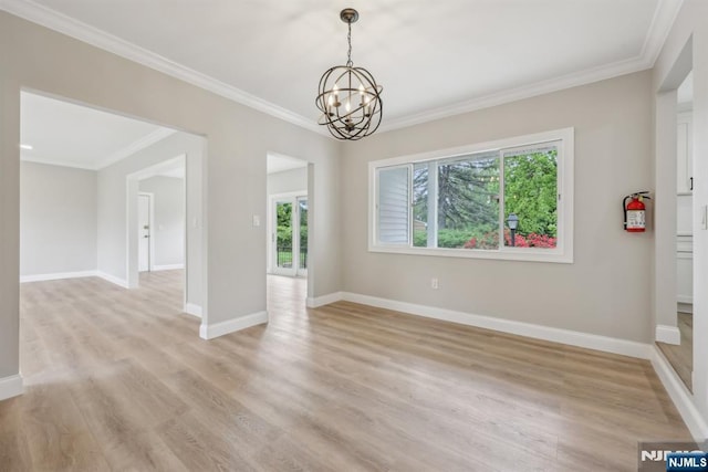 444 Black Oak Ridge Rd, Wayne, NJ 07470 - spare room featuring a chandelier, ornamental molding, light wood-type flooring, and baseboards