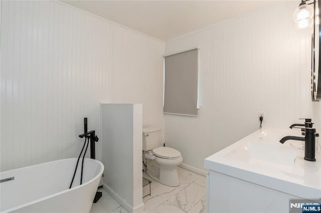 62 Valley Rd, Glen Rock, NJ 07452 - full bath featuring a soaking tub, marble finish floors, double vanity, toilet, and crown molding