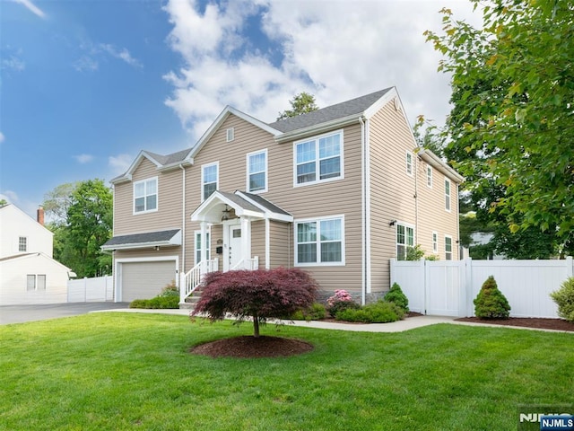 322 E Midland Ave, Paramus, NJ 07652 - view of front of house with an attached garage and driveway