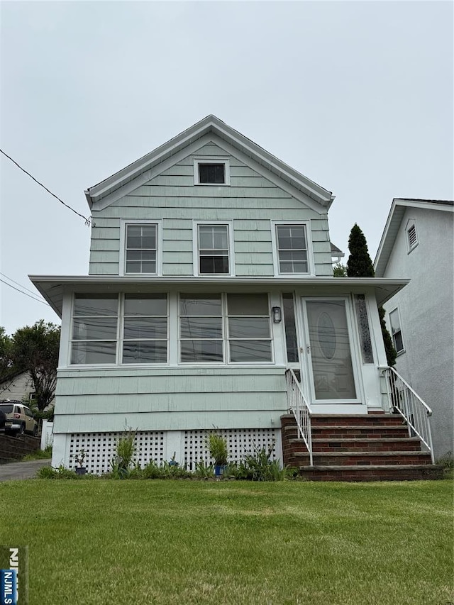 128 Prospect, Midland Park, NJ 07432 - view of front facade featuring entry steps and a front yard