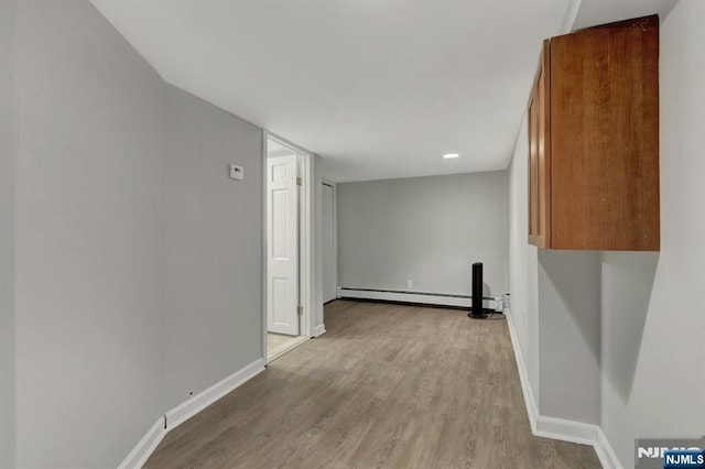 128 Prospect, Midland Park, NJ 07432 - unfurnished room featuring a baseboard heating unit, baseboards, wood finished floors, and recessed lighting