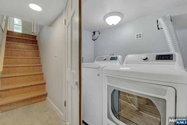 128 Prospect, Midland Park, NJ 07432 - washroom with washer and clothes dryer and baseboards