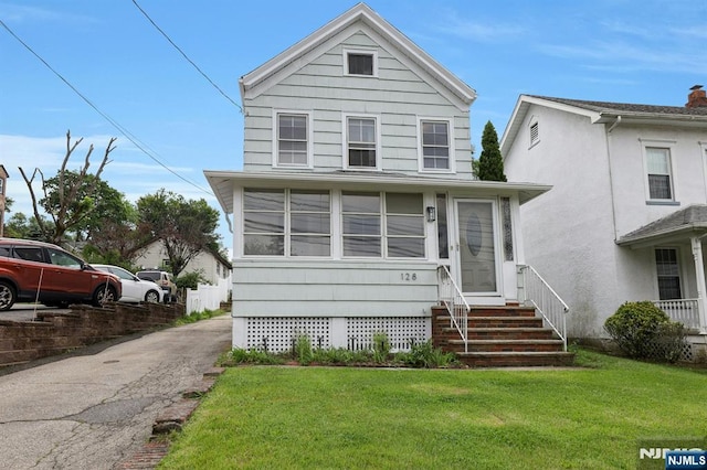 128 Prospect, Midland Park, NJ 07432 - view of front of house featuring entry steps and a front yard
