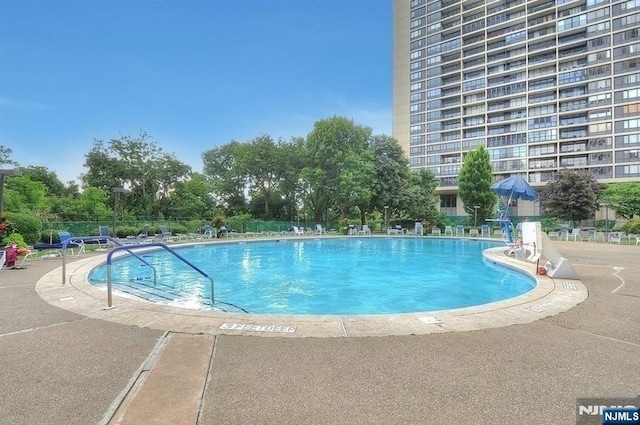 4 Horizon Rd Unit 404, Fort Lee, NJ 07024 - community pool featuring a patio area