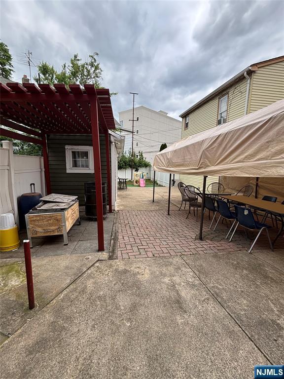65 Dey St, Paterson, NJ 07503 - view of patio featuring a pergola