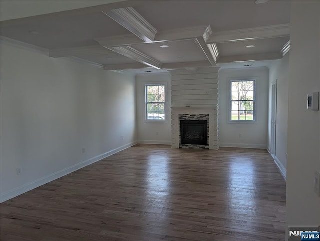 265 Adams Ave, River Edge, NJ 07661 - unfurnished living room featuring coffered ceiling, ornamental molding, wood finished floors, beam ceiling, and baseboards