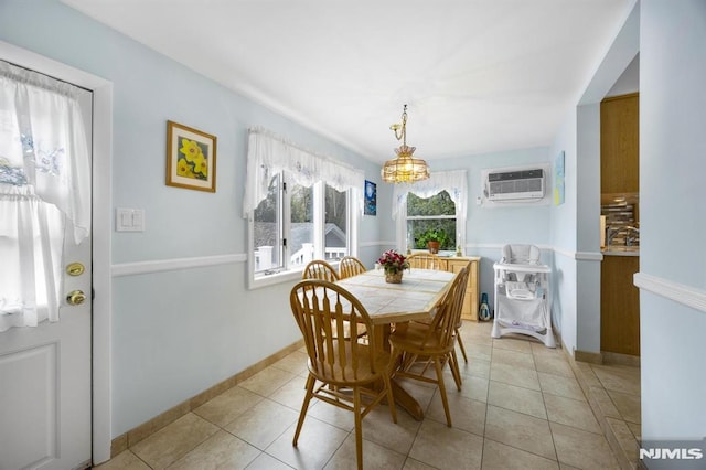 101 Pasadena Pl, Hawthorne, NJ 07506 - dining space featuring a wall mounted AC, light tile patterned floors, and baseboards