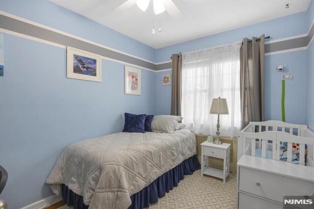 101 Pasadena Pl, Hawthorne, NJ 07506 - bedroom featuring light colored carpet and a ceiling fan