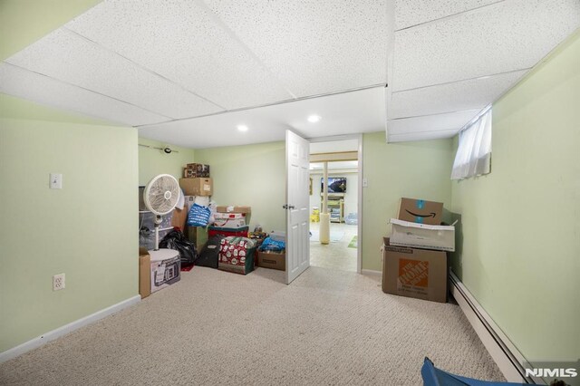 101 Pasadena Pl, Hawthorne, NJ 07506 - below grade area featuring a baseboard heating unit, carpet flooring, recessed lighting, and baseboards