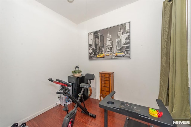 4310 Newkirk Ave, North Bergen, NJ 07047 - exercise room featuring wood finished floors and baseboards