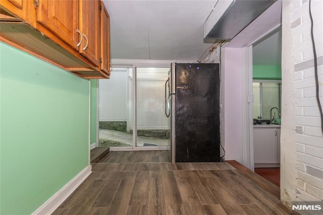 4310 Newkirk Ave, North Bergen, NJ 07047 - bathroom with wood finished floors, vanity, and baseboards